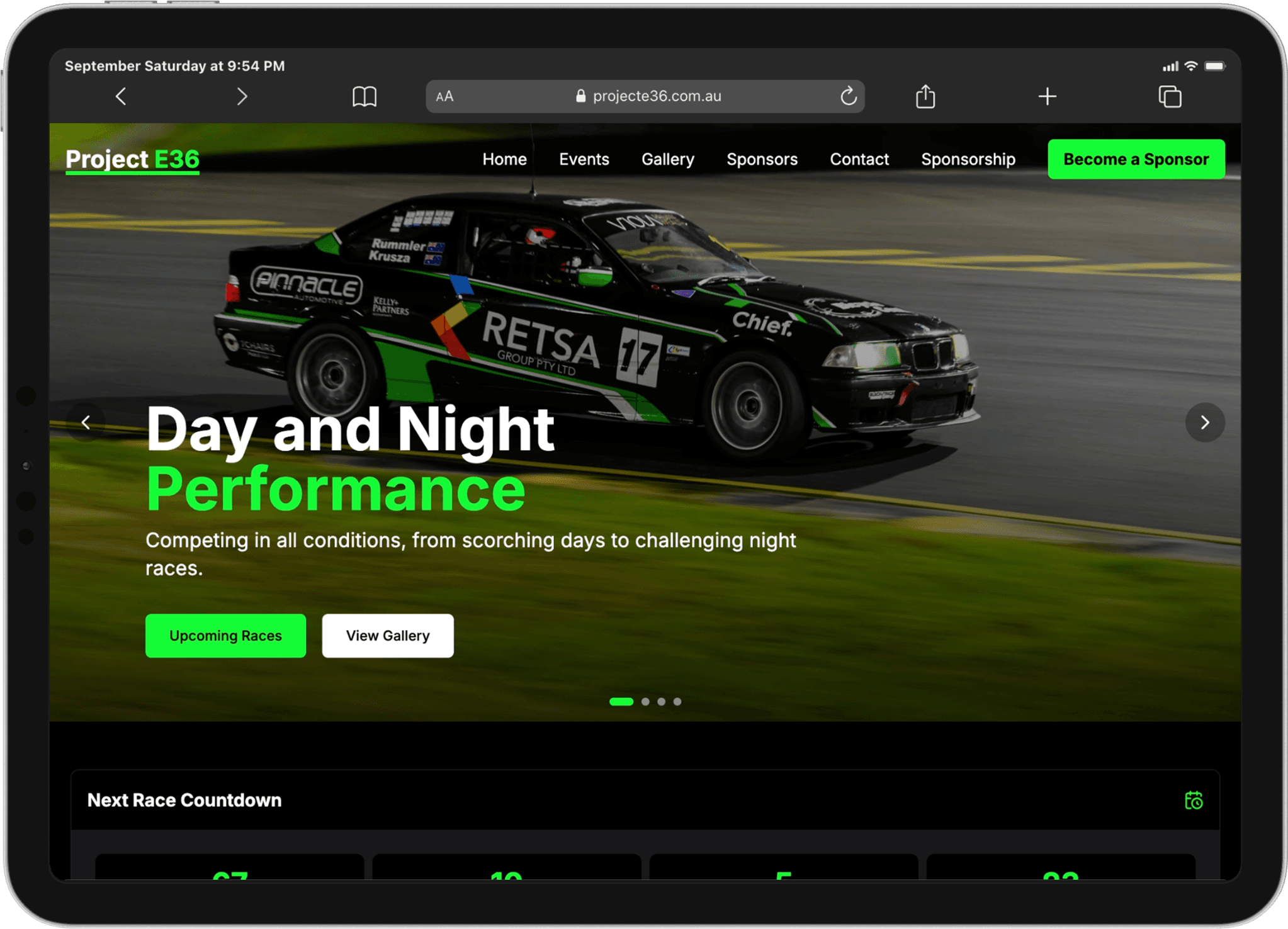 Project E36 Race Team website displayed on a landscape iPad, featuring the RETSA-sponsored BMW race car and links to upcoming races and the gallery